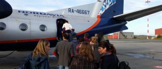 Посадка пассажиров с багажом в самолет авиакомпании Nordavia